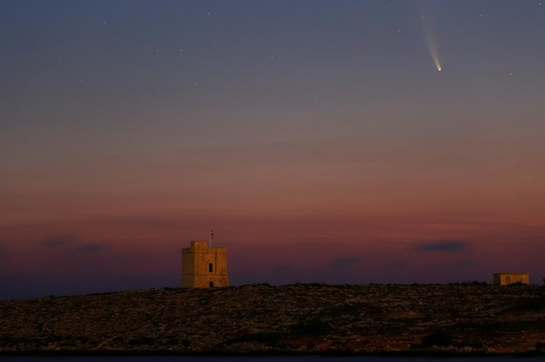 The Comet C/2020 or "Neowise" is seen in the sky behind St Mark's Tower, a 17th century coastal fortification near the village of Bahar ic-Caghaq, Malta.  REUTERS/Darrin Zammit Lupi  